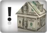a model of a house made of notes of U.S. dollars